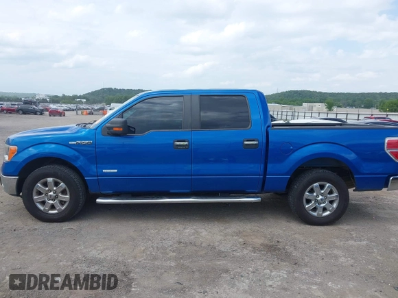 2014 Ford F-150 XL with VIN 1FTFW1CT6EKF05542, listed as a IAAI auction lot 42335272 with 169,985 mi miles and . Bid and sale history available at DreamBid. Image 14.