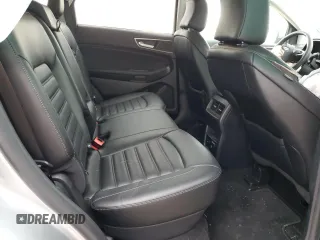 2023 Ford Edge SEL z VIN 2FMPK4J95PBA17670, wystawiony jako Copart lot #53690135 z przebiegiem 44 056 mil mil oraz Szkoda całkowita • Salvage title. Historia ofert i sprzedaży dostępna na DreamBid. Obrazek 11.