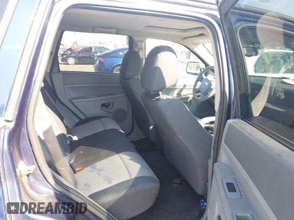 2005 Jeep Grand Cherokee Laredo with VIN 1J4HR48N45C605543, listed as a IAAI auction lot 42612473 with 158,456 mi miles and . Bid and sale history available at DreamBid. Image 8.