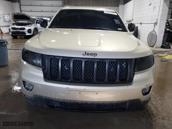 2011 Jeep Grand Cherokee Overland with VIN 1J4RR6GT1BC665906, listed as a Copart auction lot 49647095 with 141,546 mi miles and Clean Title. Bid and sale history available at carsss.com. Image 5.