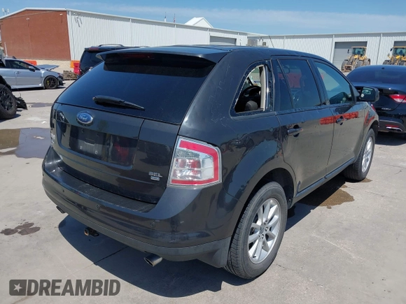 2007 Ford Edge SEL PLUS with VIN 2FMDK49CX7BA48559, listed as a IAAI auction lot 42009908 with 151,072 mi miles. Bid and sale history available at carsss.com. Image 4.