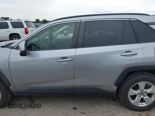 2019 Toyota RAV4 Hybrid LE with VIN JTMMWRFV3KJ012955, listed as a IAAI auction lot 42475244 with 103,674 mi miles and . Bid and sale history available at DreamBid. Image 14.