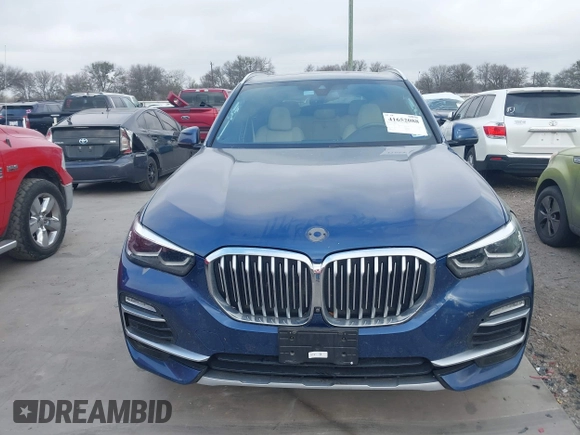 2020 BMW X5 sDrive40i with VIN 5UXCR4C07L9C27998, listed as a IAAI auction lot 41652088 with 59,009 mi miles and . Bid and sale history available at DreamBid. Image 13.