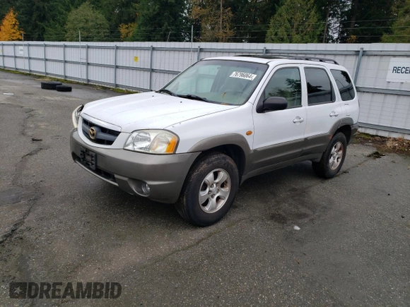 2001 Mazda Tribute LX with VIN 4F2CU08101KM11452, listed as a Copart auction lot 76796064 with 175,584 mi miles and Salvage Title. Bid and sale history available at DreamBid. Image 1.
