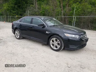 2013 Ford Taurus SEL z VIN 1FAHP2H84DG102036, wystawiony jako Copart lot #57772285 z przebiegiem 156 609 mil mil oraz Czysty tytuł • Clean title. Historia ofert i sprzedaży dostępna na DreamBid. Obrazek 4.