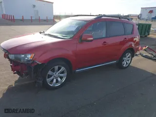 2010 Mitsubishi Outlander XLS with VIN JA4JT4AX1AZ011319, listed as a IAAI auction lot 41771768 with 153,989 mi miles. Bid and sale history available at carsss.com. Image 2.