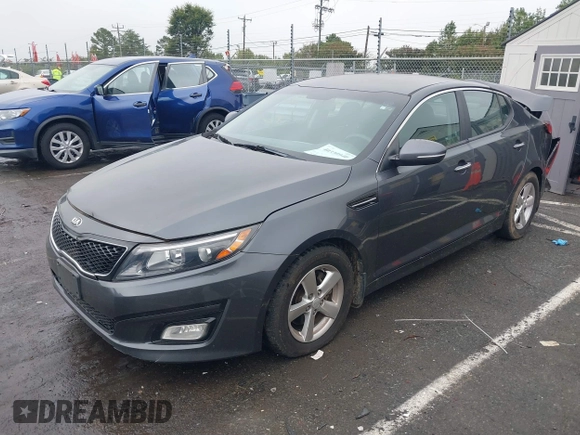 2015 Kia Optima LX z VIN KNAGM4A73F5624101, wystawiony jako IAAI lot #40746046 z przebiegiem 166 468 mil mil oraz . Historia ofert i sprzedaży dostępna na DreamBid. Obrazek 2.