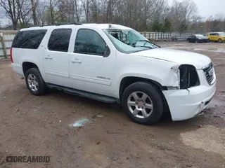 2013 GMC Yukon XL SLT with VIN 1GKS1KE00DR335954, listed as a IAAI auction lot 41823135 with 208,876 mi miles. Bid and sale history available at carsss.com. Image 1.