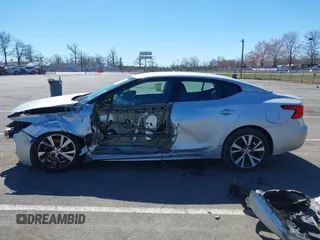 2016 Nissan Maxima SV z VIN 1N4AA6AP0GC905126, wystawiony jako IAAI lot #41849223 z przebiegiem 87 968 mil mil oraz . Historia ofert i sprzedaży dostępna na DreamBid. Obrazek 14.