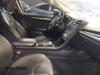 2017 Ford Fusion Titanium with VIN 3FA6P0D93HR197617, listed as a IAAI auction lot 41673022 with 65,041 mi miles and . Bid and sale history available at DreamBid. Image 5.