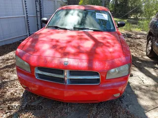 2009 Dodge Charger SXT with VIN 2B3KA33V49H556093, listed as a IAAI auction lot 42048956 with 164,284 mi miles. Bid and sale history available at carsss.com. Image 6.
