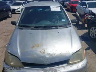 2000 Toyota ECHO with VIN JTDAT1234Y5016760, listed as a IAAI auction lot 41974124 with 188,323 mi miles. Bid and sale history available at carsss.com. Image 12.