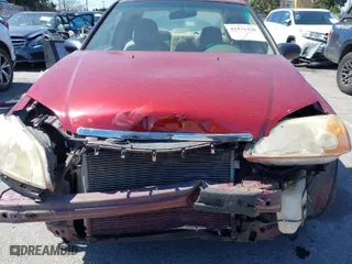 2002 Honda Civic LX with VIN 2HGES16512H580836, listed as a IAAI auction lot 41831420 with 164,043 mi miles. Bid and sale history available at carsss.com. Image 12.