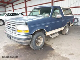 1993 Ford Bronco XL with VIN 1FMEU15N1PLB29714, listed as a IAAI auction lot 41984437 with 165,195 mi miles. Bid and sale history available at carsss.com. Image 2.