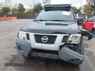 2012 Nissan Xterra S with VIN 5N1AN0NW4CC523071, listed as a IAAI auction lot 41874263 with 154,556 mi miles and . Bid and sale history available at DreamBid. Image 13.