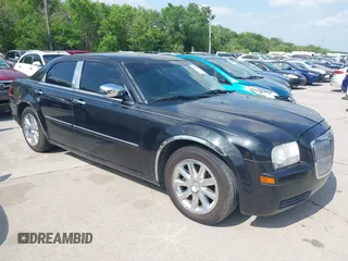 2007 Chrysler 300 with VIN 2C3LA43R57H875094, listed as a IAAI auction lot 42059007 with 125,067 mi miles. Bid and sale history available at carsss.com. Image 1.