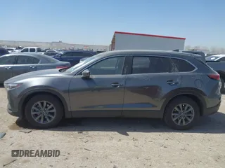 2021 Mazda CX-9 Touring with VIN JM3TCACY2M0502016, listed as a IAAI auction lot 41825456 with 86,068 mi miles and . Bid and sale history available at carsss.com. Image 14.