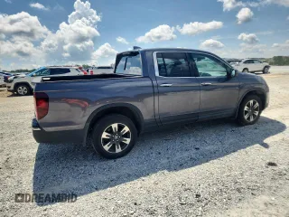 2017 Honda Ridgeline RTL-E with VIN 5FPYK3F79HB031142, listed as a Copart auction lot 62365885 with 134,517 mi miles and Salvage title. Bid and sale history available at DreamBid. Image 3.