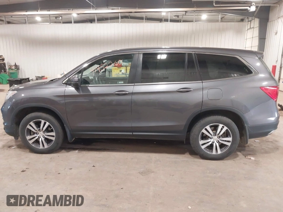 2018 Honda Pilot EX-L with VIN 5FNYF6H52JB052141, listed as a IAAI auction lot 41452260 with 113,382 mi miles. Bid and sale history available at carsss.com. Image 14.