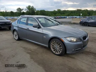 2011 BMW 3 Series 335i xDrive with VIN WBAPL5C57BA920132, listed as a Copart auction lot 61414035 with 94,215 mi miles and Clean title. Bid and sale history available at DreamBid. Image 4.