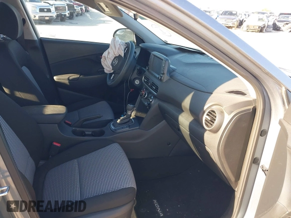 2021 Hyundai Kona SE with VIN KM8K12AA9MU667653, listed as a IAAI auction lot 41889973 with 30,399 mi miles and . Bid and sale history available at DreamBid. Image 5.
