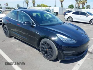 2018 Tesla Model 3 Long Range Battery z VIN 5YJ3E1EA0JF172263, wystawiony jako IAAI lot #42266657 z przebiegiem 98 164 mil mil oraz . Historia ofert i sprzedaży dostępna na DreamBid. Obrazek 1.