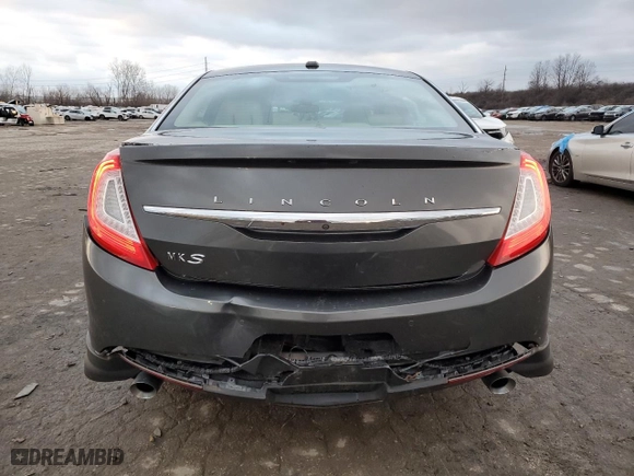2015 Lincoln MKS with VIN 1LNHL9DK6FG608174, listed as a Copart auction lot 87168024 with 63,527 mi miles and Salvage Title. Bid and sale history available at carsss.com. Image 6.