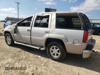 2000 GMC Denali z VIN 1GKEK13R2YR138523, wystawiony jako Copart lot #77609804 z przebiegiem 203 514 mil mil oraz Szkody całkowita. Historia ofert i sprzedaży dostępna na DreamBid. Obrazek 2.