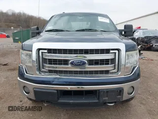 2014 Ford F-150 XL z VIN 1FTFW1ETXEFA50751, wystawiony jako IAAI lot #42055118 z przebiegiem 196 808 mil mil oraz . Historia ofert i sprzedaży dostępna na DreamBid. Obrazek 13.
