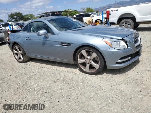 2012 Mercedes-Benz SLK 350 with VIN WDDPK5HA9CF017809, listed as a Copart auction lot 56926895 with 106,692 mi miles and Clean title. Bid and sale history available at DreamBid. Image 4.