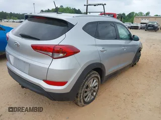 2016 Hyundai Tucson SE z VIN KM8J33A48GU116852, wystawiony jako IAAI lot #42111656 z przebiegiem 138 656 mil mil oraz . Historia ofert i sprzedaży dostępna na DreamBid. Obrazek 4.