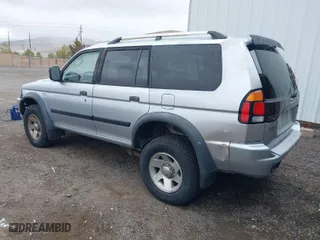 2004 Mitsubishi Montero Sport LS with VIN JA4MT21R24J003641, listed as a IAAI auction lot 41809144 with 223,449 mi miles. Bid and sale history available at carsss.com. Image 3.