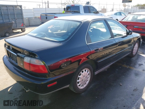 1997 Honda Accord EX with VIN 1HGCD5669VA219584, listed as a IAAI auction lot 41643524 with 161,820 mi miles and . Bid and sale history available at carsss.com. Image 4.