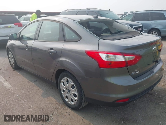 2012 Ford Focus SE z VIN 1FAHP3F24CL227225, wystawiony jako IAAI lot #42389939 z przebiegiem 135 197 mil mil oraz . Historia ofert i sprzedaży dostępna na DreamBid. Obrazek 3.