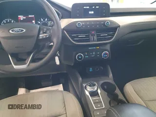 2021 Ford Escape S with VIN 1FMCU0F6XMUA97053, listed as a IAAI auction lot 42722823 with 34,859 mi miles and . Bid and sale history available at DreamBid. Image 8.