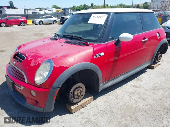 2005 MINI Hardtop S with VIN WMWRE33535TL12429, listed as a IAAI auction lot 42162496 with 176,573 mi miles and . Bid and sale history available at DreamBid. Image 2.