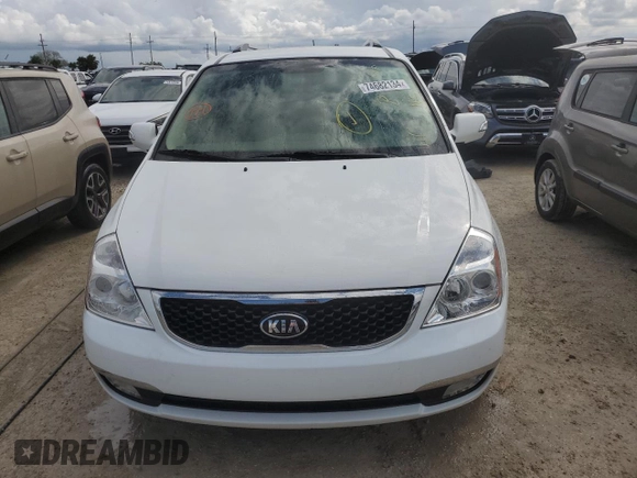 2014 Kia Sedona EX with VIN KNDMH4C70E6568487, listed as a Copart auction lot 74682134 with 69,977 mi miles and Salvage Title. Bid and sale history available at carsss.com. Image 5.
