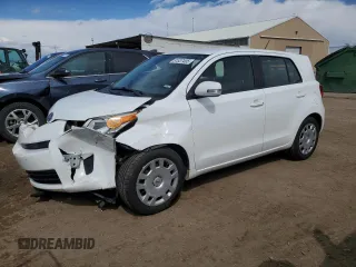 2009 Scion xD with VIN JTKKU10499J033911, listed as a Copart auction lot 51537495 with 123,584 mi miles and Salvage Title. Bid and sale history available at carsss.com. Image 1.