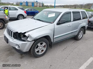 2007 Jeep Grand Cherokee Laredo with VIN 1J8GR48K47C687339, listed as a IAAI auction lot 41904034 with 158,661 mi miles. Bid and sale history available at carsss.com. Image 2.