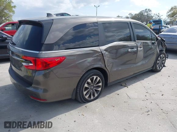 2022 Honda Odyssey EX-L with VIN 5FNRL6H77NB031502, listed as a IAAI auction lot 41706098 with 57,074 mi miles and . Bid and sale history available at DreamBid. Image 4.