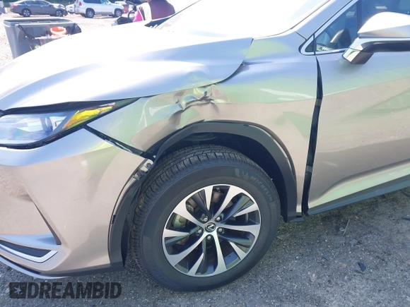 2021 Lexus RX 350 with VIN 2T2AZMAA3MC186617, listed as a IAAI auction lot 42226167 with 133,435 mi miles and . Bid and sale history available at DreamBid. Image 6.