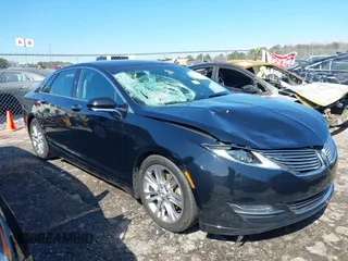 2016 Lincoln MKZ z VIN 3LN6L2G92GR612255, wystawiony jako IAAI lot #41647296 z przebiegiem 130 996 mil mil oraz . Historia ofert i sprzedaży dostępna na DreamBid. Obrazek 1.