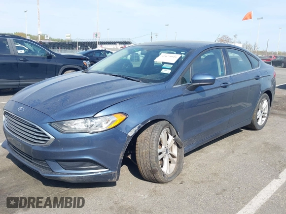 2018 Ford Fusion SE z VIN 3FA6P0H74JR176113, wystawiony jako IAAI lot #42074916 z przebiegiem 78 940 mil mil oraz . Historia ofert i sprzedaży dostępna na DreamBid. Obrazek 6.