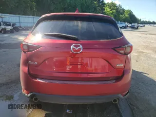 2018 Mazda CX-5 Grand Touring with VIN JM3KFADM9J0398036, listed as a Copart auction lot 62284145 with 118,827 mi miles and Salvage title. Bid and sale history available at DreamBid. Image 6.