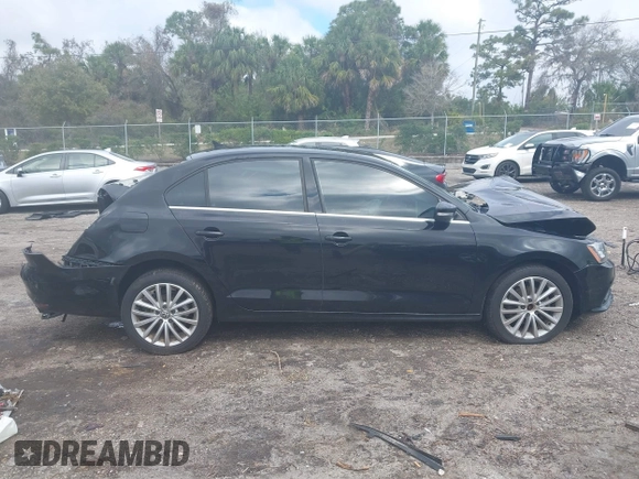 2016 Volkswagen Jetta Sedan 1.8T SEL with VIN 3VWL07AJ9GM258065, listed as a IAAI auction lot 41617182 with 164,891 mi miles. Bid and sale history available at carsss.com. Image 13.