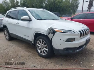 2014 Jeep Cherokee Limited with VIN 1C4PJLDB2EW173127, listed as a IAAI auction lot 42413180 with 107,871 mi miles and . Bid and sale history available at DreamBid. Image 1.