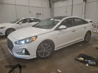 2018 Hyundai Sonata Hybrid Limited with VIN KMHE34L3XJA083972, listed as a Copart auction lot 82040614 with 124,717 mi miles and Salvage Title. Bid and sale history available at carsss.com. Image 1.
