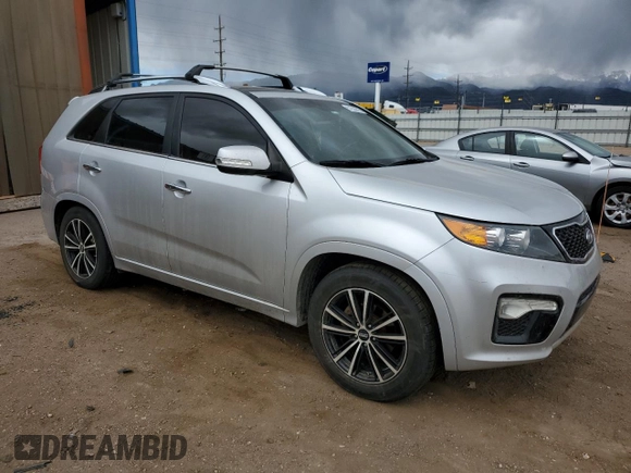 2012 Kia Sorento SX with VIN 5XYKW4A20CG243238, listed as a Copart auction lot 57533915 with 174,954 mi miles and Salvage title. Bid and sale history available at DreamBid. Image 4.