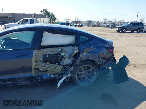 2022 Tesla Model 3 Long Range z VIN 5YJ3E1EB2NF251772, wystawiony jako IAAI lot #41773684 z przebiegiem 28 500 mil mil oraz . Historia ofert i sprzedaży dostępna na DreamBid. Obrazek 6.