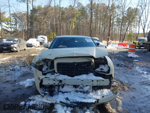 2009 Chrysler 300 Touring with VIN 2C3KA53V99H621745, listed as a IAAI auction lot 41604655 with 115,004 mi miles. Bid and sale history available at carsss.com. Image 6.